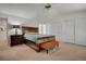 Spacious main bedroom with a large bed, ceiling fan, and closet at 7557 S Cove Cir, Centennial, CO 80122
