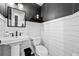 Stylish half-bathroom with modern fixtures and design at 21005 Glacier Park Cv, Parker, CO 80138