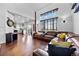 Bright and spacious living room featuring high ceilings with an open floor plan and lots of natural light at 21005 Glacier Park Cv, Parker, CO 80138