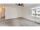 Bright bedroom with a large window, ceiling fan and neutral carpet at 7902 Chase Cir # 152, Arvada, CO 80003