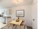 Cozy dining area features a wooden table, comfortable seating, and stylish lighting at 7902 Chase Cir # 152, Arvada, CO 80003