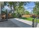 Large back patio and stairs leading to deck, perfect for relaxing and entertaining at 10863 W 67Th Pl, Arvada, CO 80004