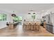 Spacious kitchen with stainless steel appliances and bar stool seating at 10863 W 67Th Pl, Arvada, CO 80004