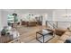 Open floor plan showing the living room, kitchen, and dining area at 10863 W 67Th Pl, Arvada, CO 80004