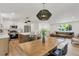 Spacious open concept living area with kitchen, dining area, and living room at 10863 W 67Th Pl, Arvada, CO 80004