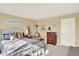 Cozy bedroom with ample natural light, decorative pillows and a comfortable bed at 16367 E Auburn Hills Dr, Parker, CO 80134