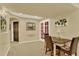 Dining room featuring neutral walls, modern decor, and seating for four at 16367 E Auburn Hills Dr, Parker, CO 80134