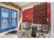 Inviting front porch features comfortable seating, a decorative screen, and a charming view at 16367 E Auburn Hills Dr, Parker, CO 80134