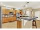 Well-equipped kitchen with modern appliances and a breakfast bar for casual dining at 16367 E Auburn Hills Dr, Parker, CO 80134