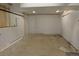 Unfinished basement featuring concrete walls and floors, offering potential for customization at 5237 S Olive Rd, Evergreen, CO 80439