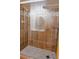 Modern bathroom featuring a glass shower and tile surround at 5237 S Olive Rd, Evergreen, CO 80439