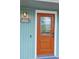 Elegant front door featuring a decorative glass pane, stylish house number, and modern doorbell at 5237 S Olive Rd, Evergreen, CO 80439