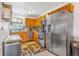 Well-equipped kitchen features stainless steel appliances, including a modern dishwasher at 2279 Coronado Pkwy # B, Denver, CO 80229
