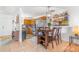 Well-lit kitchen with stainless steel appliances and dining area at 2279 Coronado Pkwy # B, Denver, CO 80229