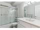 Bathroom featuring a shower over the tub and modern fixtures at 695 S Alton Way # 5A, Denver, CO 80247