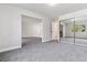 Spacious bedroom boasts ample natural light and a large mirrored closet at 695 S Alton Way # 5A, Denver, CO 80247