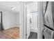 Clean bathroom with a white tub, shower, and modern vanity at 1846 S Lowell Blvd, Denver, CO 80219