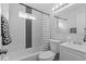 Simple bathroom with white subway tiles and a shower/tub combo at 1846 S Lowell Blvd, Denver, CO 80219