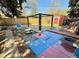 Backyard patio with outdoor seating and shed at 2213 S Meade Street, Denver, CO 80219