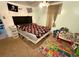 Bedroom with decor, a ceiling fan, and natural light at 2213 S Meade Street, Denver, CO 80219