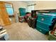 Bedroom with carpet filled with storage bins and suitcases at 2213 S Meade Street, Denver, CO 80219