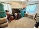 Bedroom filled with storage bins and suitcases at 2213 S Meade Street, Denver, CO 80219