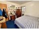 Bedroom with bed, mirror, and dresser at 2213 S Meade Street, Denver, CO 80219