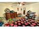 Bedroom features a ceiling fan, a wooden dresser, and natural light at 2213 S Meade Street, Denver, CO 80219