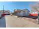 Cozy single-story home with a covered front porch and spacious concrete driveway at 4024 W Kentucky Ave # A And B, Denver, CO 80219