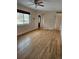 Inviting living room with gleaming hardwood floors, ample natural light, and a welcoming atmosphere at 1390 Ash Ct, Thornton, CO 80229