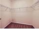 Walk-in closet with wire shelving and neutral carpet at 11316 Colony Cir, Broomfield, CO 80021