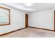 Empty basement bedroom with new carpet and window at 4251 S Fairplay Cir # E, Aurora, CO 80014