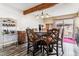 Dining area with round table, and access to back patio at 4251 S Fairplay Cir # E, Aurora, CO 80014