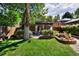 Spacious backyard with mature trees and garden at 1445 Elm St, Denver, CO 80220