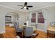 Bright dining room with hardwood floors and a view to living room at 1445 Elm St, Denver, CO 80220