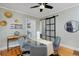 Dining room with glass table and view to kitchen at 1445 Elm St, Denver, CO 80220