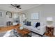 Light-filled living room with a fireplace and comfortable seating at 1445 Elm St, Denver, CO 80220