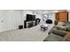 Finished basement with living area, and large TV at 11220 Keota St, Parker, CO 80134