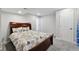 Basement bedroom with carpeted floor and floral bedding at 11220 Keota St, Parker, CO 80134