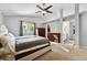 Bright main bedroom with plush carpet and ample closet space at 11220 Keota St, Parker, CO 80134