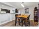 Charming dining room with hardwood floors and kitchen view at 11220 Keota St, Parker, CO 80134