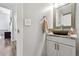 Modern powder room with updated vanity and mosaic tile at 11220 Keota St, Parker, CO 80134