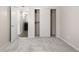 Bedroom with carpet, closet, and access to bathroom and laundry at 3663 S Sheridan Blvd # 2, Denver, CO 80235