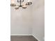 Dining room with contemporary chandelier and neutral paint, creating an inviting atmosphere at 3663 S Sheridan Blvd # 2, Denver, CO 80235