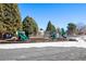 Community playground with slides and climbing equipment at 3663 S Sheridan Blvd # 2, Denver, CO 80235