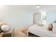 Spacious bedroom with comfortable seating, natural light, and neutral color palette at 6829 S Niagara Ct, Centennial, CO 80112