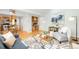 Open-concept living space showcasing natural light, modern decor and wood floors at 6829 S Niagara Ct, Centennial, CO 80112