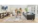 Cozy living room with fireplace, stylish decor, and ample natural light at 6829 S Niagara Ct, Centennial, CO 80112