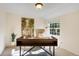 Bright office featuring modern desk, stylish decor, and natural light from the window at 6829 S Niagara Ct, Centennial, CO 80112