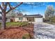 Charming single-story home with well-manicured lawn and solar panels on the roof at 5085 E Missouri Ave, Denver, CO 80246